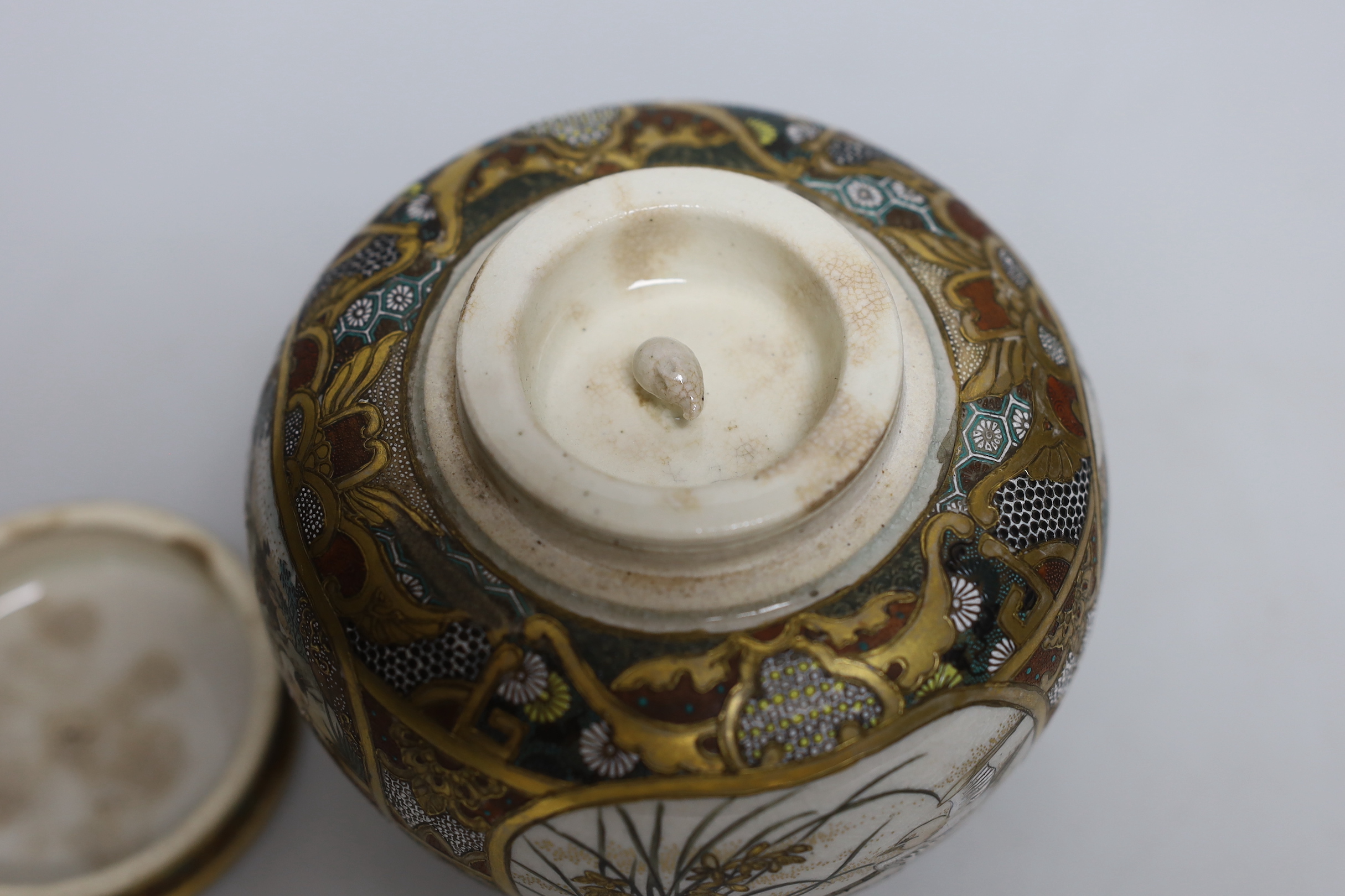 A Japanese Satsuma lidded jar and cover, 12cm high